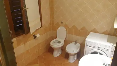 Bagno di Capo Figari 15, Appartamento spazioso nel centro di Golfo Aranci con terrazza, Wi-Fi, parcheggio gratuito