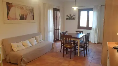 Area soggiorno di Capo Figari 15, Appartamento spazioso nel centro di Golfo Aranci con terrazza, Wi-Fi, parcheggio gratuito