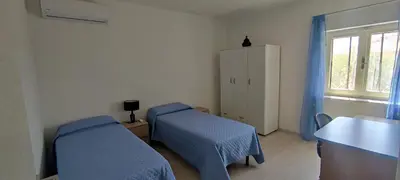 Letto o letti in una camera di Appartamento Mimose