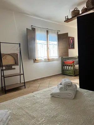 Letto o letti in una camera di RusticHome