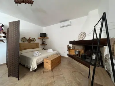 Letto o letti in una camera di RusticHome