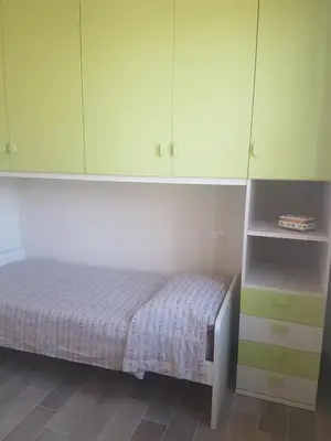 Letto o letti in una camera di Casa ORCHIDEA