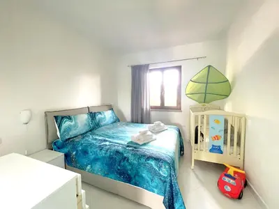 Letto o letti in una camera di Vecchio Ulivo PuntoCasaBudoni