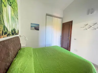 Letto o letti in una camera di Citai Sea View House st4 - PuntoCasaBudoni