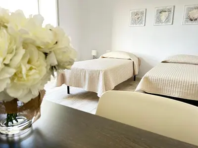Letto o letti in una camera di Domus DELEDDA