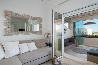 Area soggiorno di Le Dune Apartment