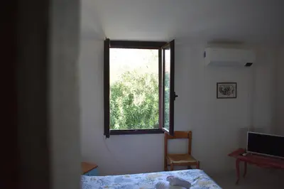 Letto o letti in una camera di Appartamenti San Teodoro