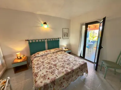 Letto o letti in una camera di Appartamenti San Teodoro