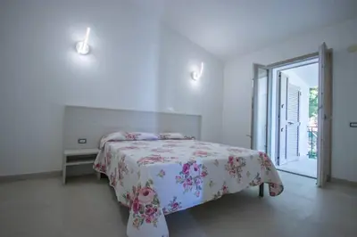Letto o letti in una camera di Conchiglia Nord