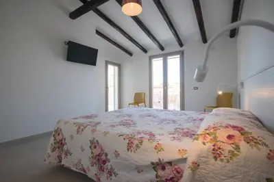 Letto o letti in una camera di Conchiglia Sud
