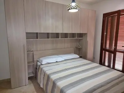 Letto o letti in una camera di Villetta La Cinta
