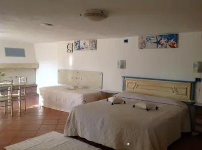 Letto o letti in una camera di Addisora Appartamenti