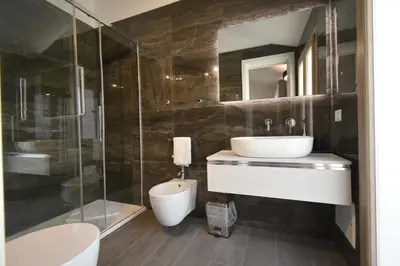 Bagno di CAVOUR ROOMS