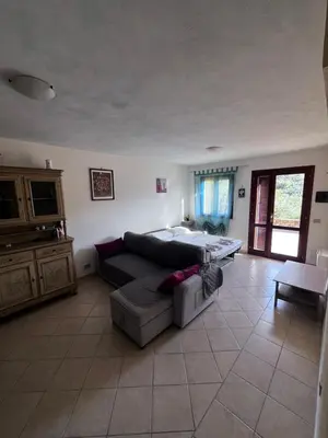 Letto o letti in una camera di Grazioso monolocale con vista su Tavolara