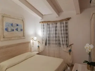 Letto o letti in una camera di Hotel Tabby