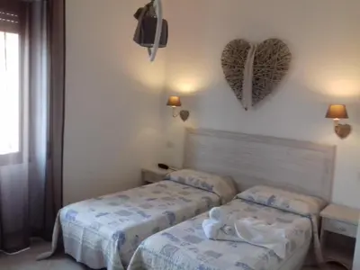Letto o letti in una camera di Hotel Tabby