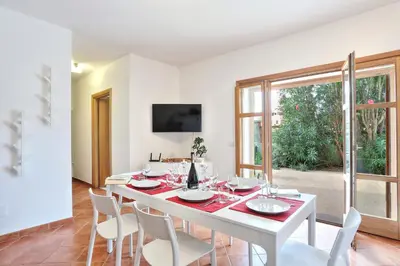 TV o dispositivi per l'intrattenimento presso Isola Blu, Jacuzzi & Pool by DomusAway