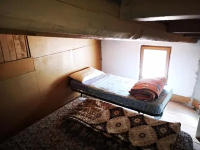 Letto o letti in una camera di Pinnettu sardo casa di campagna in ecosistema insetti e animaletti simpatici in condivisione,Leggere attentamente Prima di prenotare