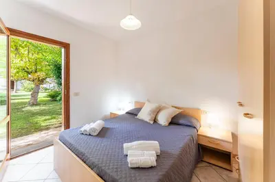 Letto o letti in una camera di Le Dimore appartamenti