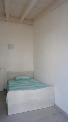 Letto o letti in una camera di Villetta La Caletta