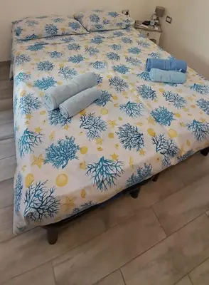 Letto o letti in una camera di Stella Marys Sud