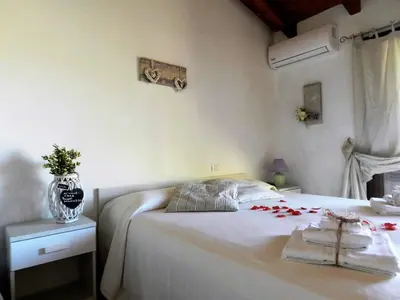 Letto o letti in una camera di Donnigheddu