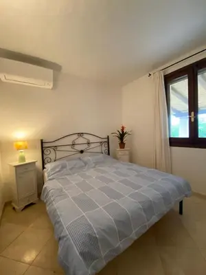 Letto o letti in una camera di Villa Alba Chiara