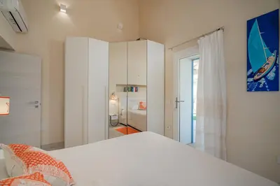 Letto o letti in una camera di Case al mare di Cala Saccaia