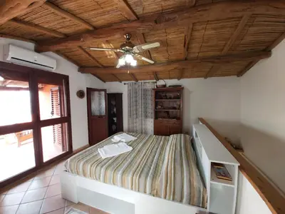 Letto o letti in una camera di La Dimora degli Dei