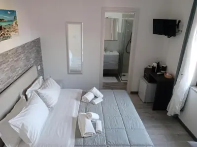 Letto o letti in una camera di The sunset
