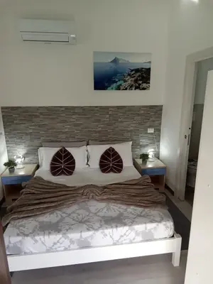Letto o letti in una camera di The sunset