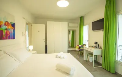 Letto o letti in una camera di Artemisia Home