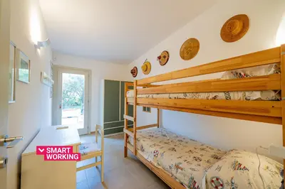 Letto o letti in una camera di Casa Loris by Wonderful Italy