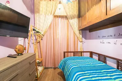 Letto o letti in una camera di Piccolo e intimo centro città