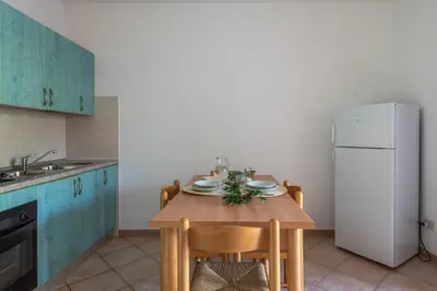 Cucina o angolo cottura di Le Dimore di Budoni Apartments
