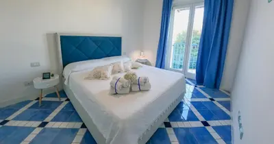 Letto o letti in una camera di Acqua Marina Apartment
