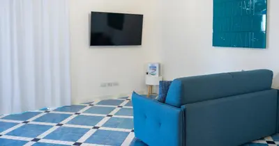 TV o dispositivi per l'intrattenimento presso Acqua Marina Apartment
