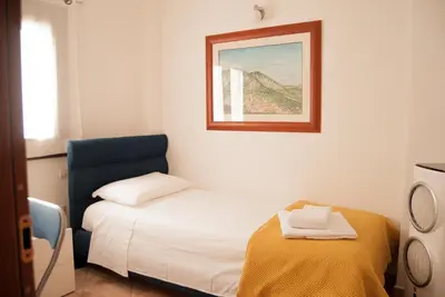 Letto o letti in una camera di Sotza’s Little House