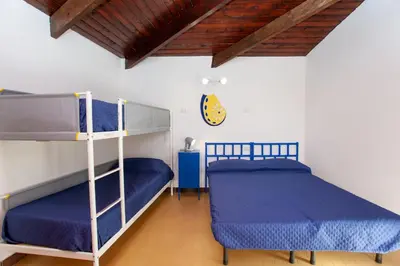 Letto o letti in una camera di Villa Smeralda