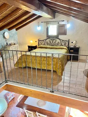 Letto o letti in una camera di ISS Travel, Li Funnesi House - with private garden, air-condition and two bathrooms