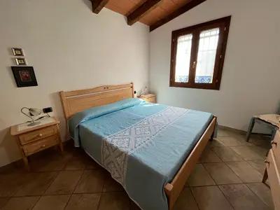 Letto o letti in una camera di Casa Costera