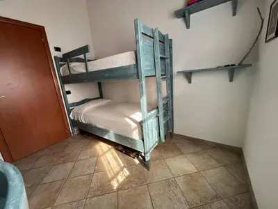 Letto o letti in una camera di Casa Costera