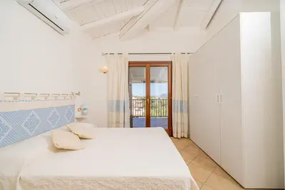 Letto o letti in una camera di Casa Lola by Wonderful Italy