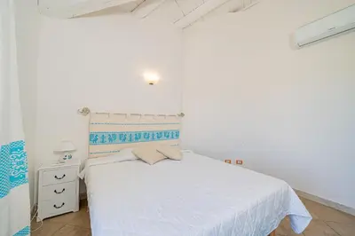 Letto o letti in una camera di Casa Lola by Wonderful Italy
