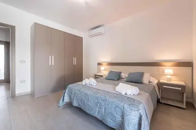 Letto o letti in una camera di Holiday home in Stintino 23209