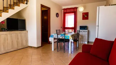 Cucina o angolo cottura di Appartamento sette posti vicino al centro di San Teodoro