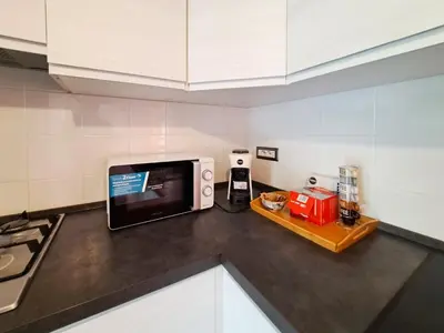 Cucina o angolo cottura di Appartamento Trilocale vicino al centro di San Teodoro