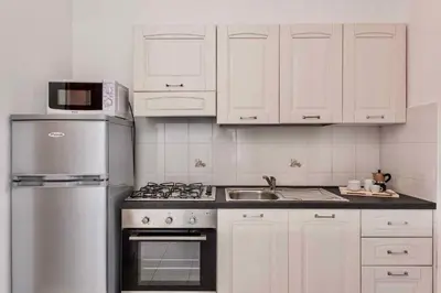 Cucina o angolo cottura di Apartments in San Teodoro 43450