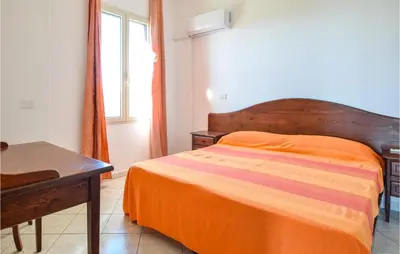 Letto o letti in una camera di Pet Friendly Home In Orosei