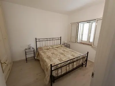 Letto o letti in una camera di DILETTA M
